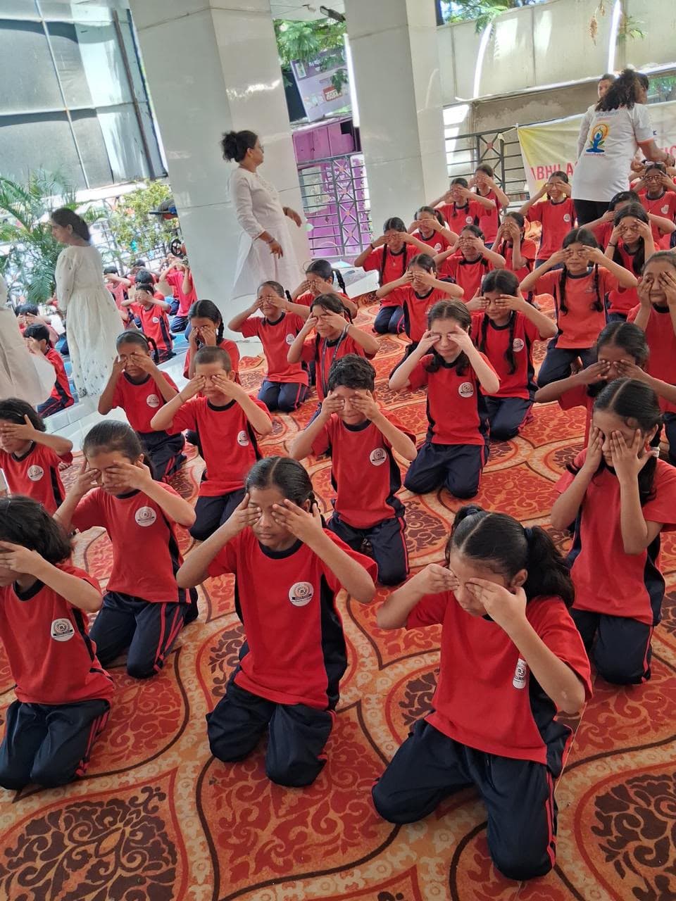 Students practicing yoga eye exercises